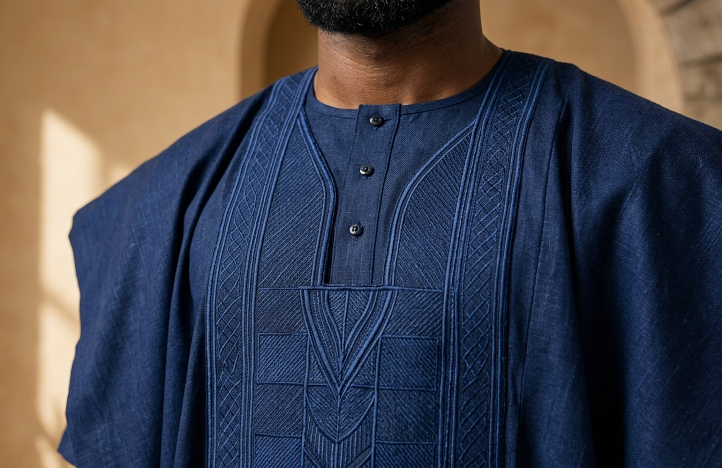 Detail editorial view of the Asante Agbada Set