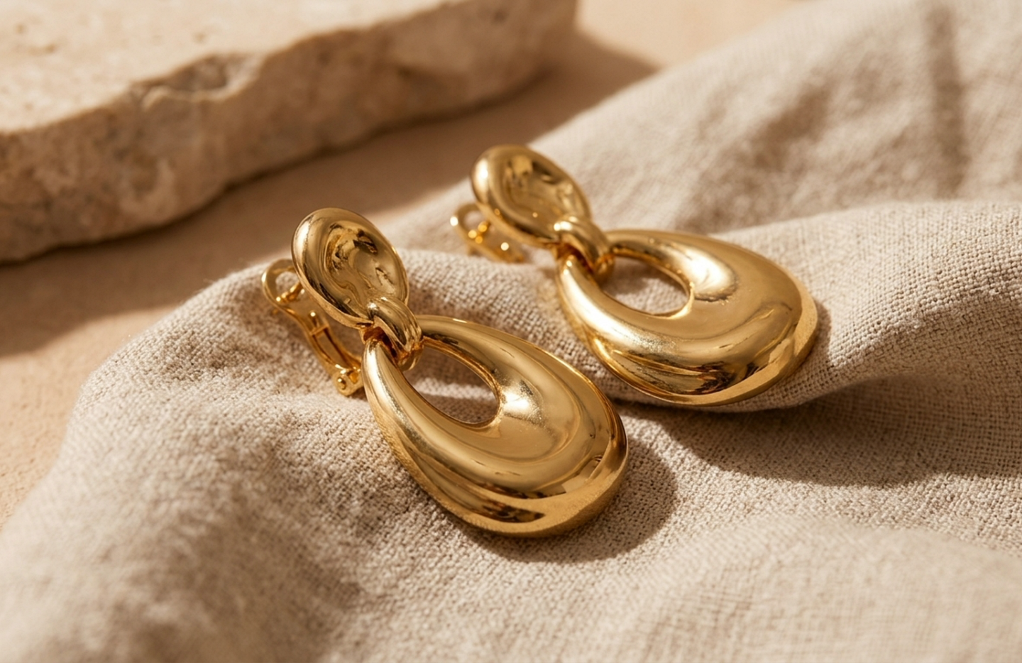 Detail editorial view of the Ayana Sculptural Gold Earrings