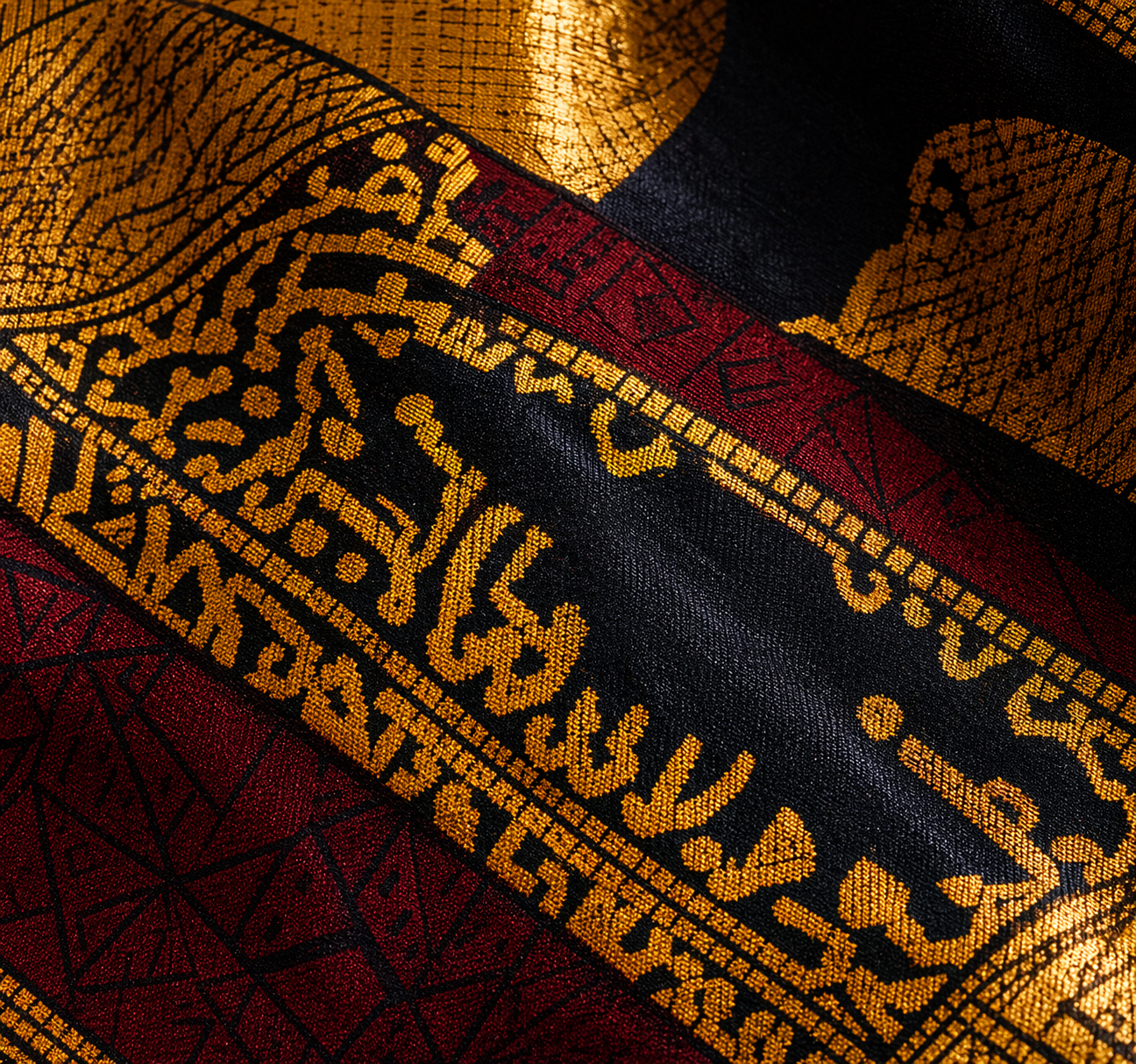 Close view of gold and black textile detail
