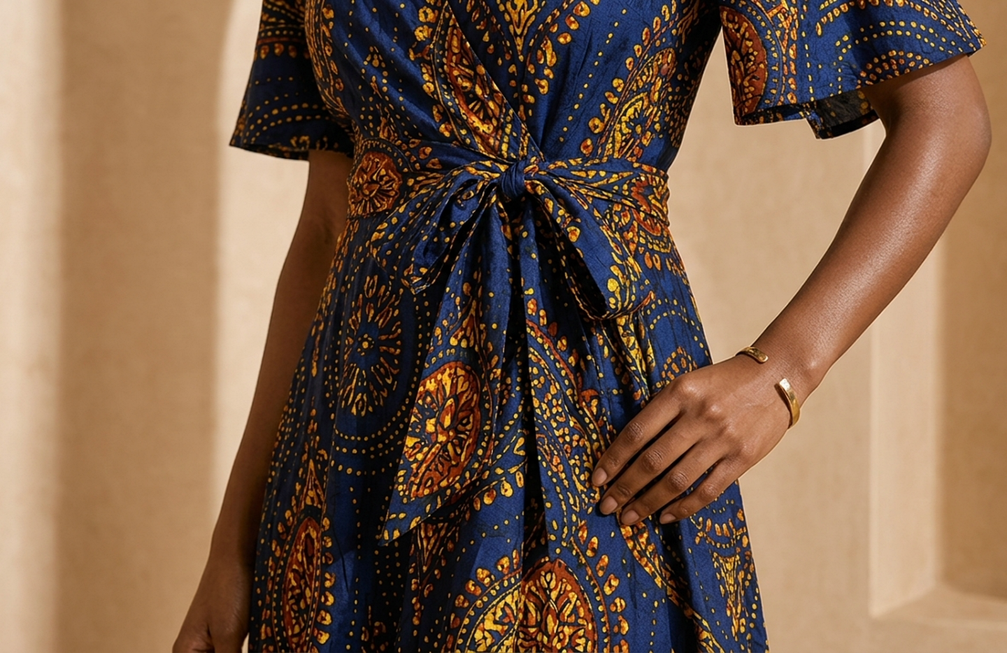 Detail editorial view of the Kemi Wrap Dress