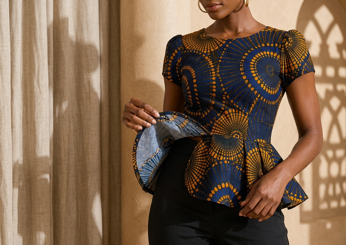 Close editorial view of the Nia Peplum Top