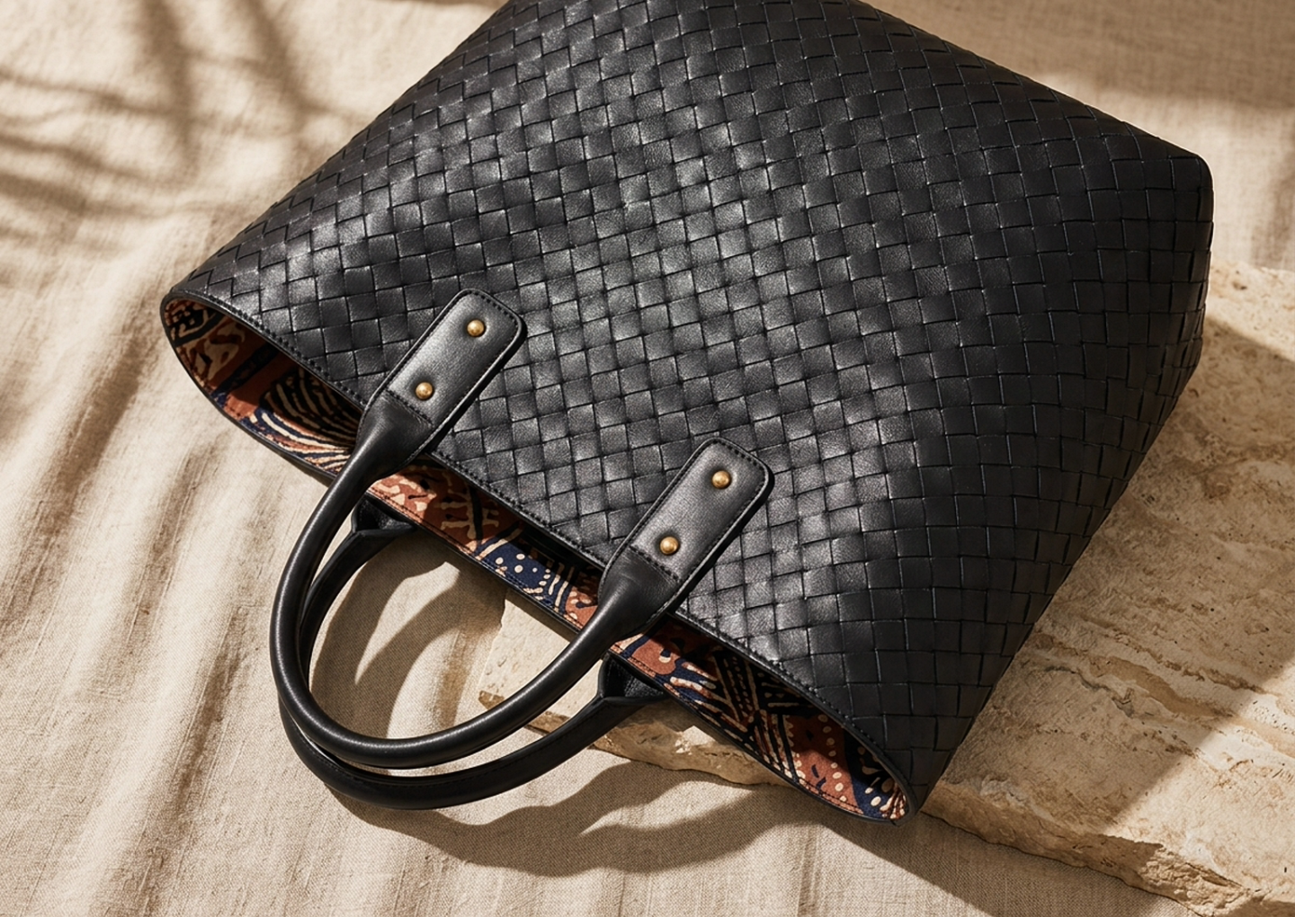 Close editorial view of the Nuba Woven Leather Tote