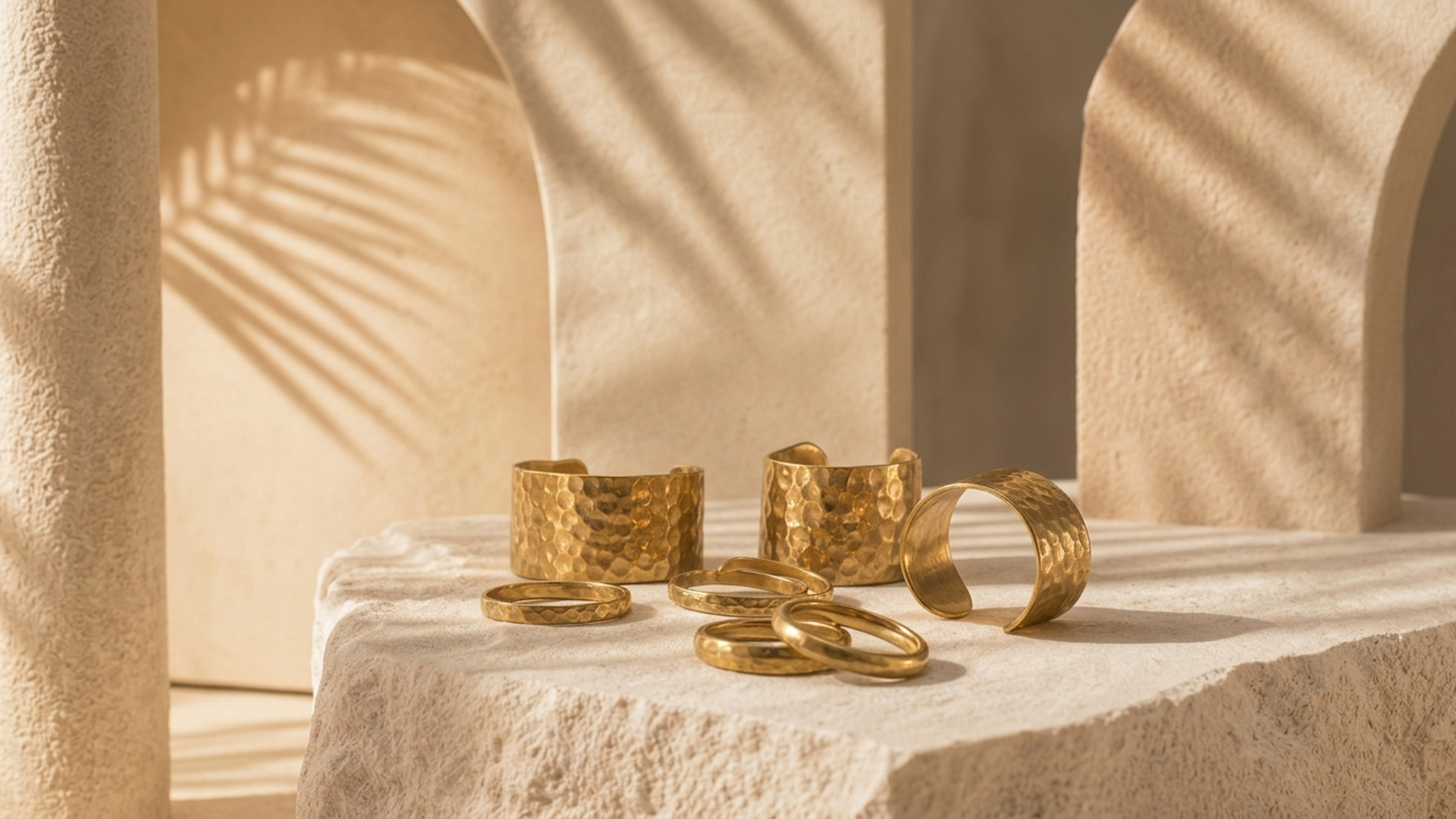 Editorial movement view of the Oru Hammered Brass Ring Set