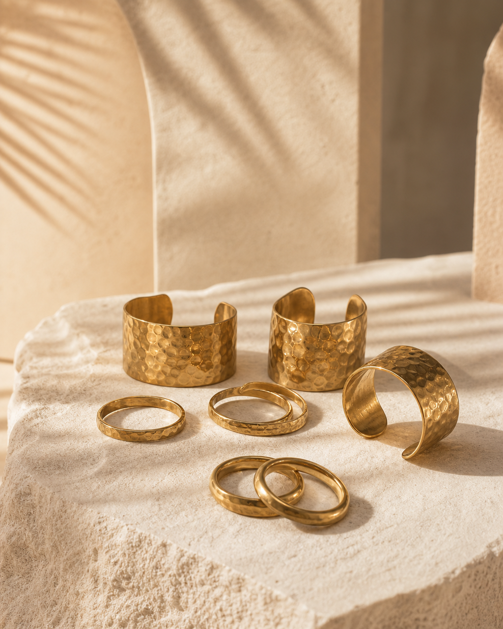 Model wearing or styling the Oru Hammered Brass Ring Set