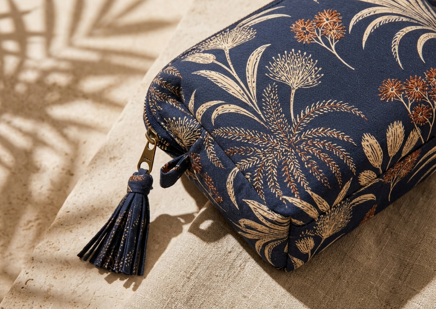 Close editorial view of the Tula Printed Travel Pouch