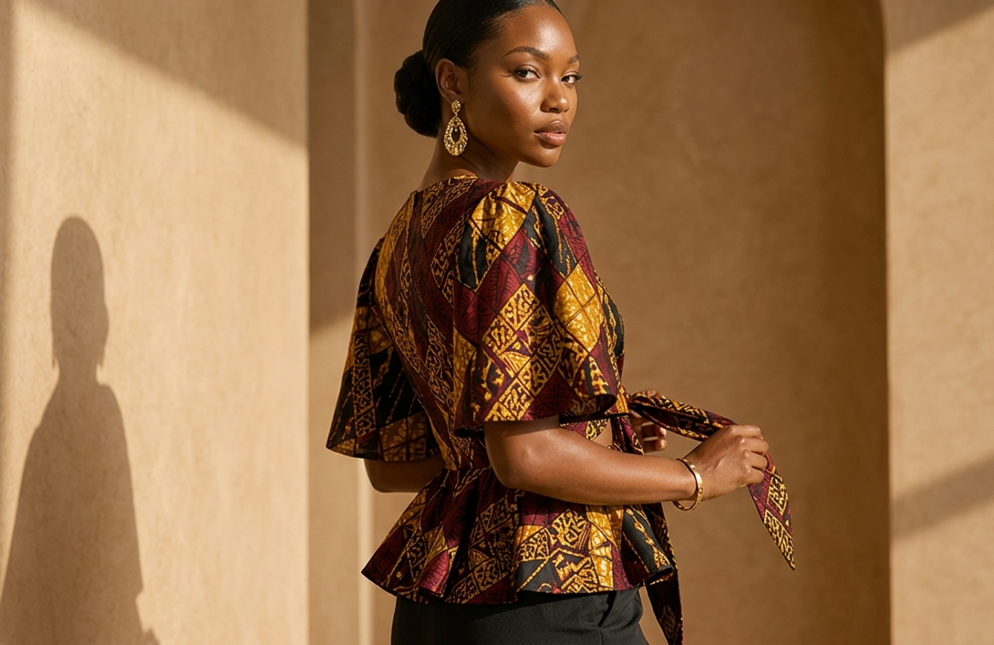 Detail editorial view of the Yaa Tie-Front Top